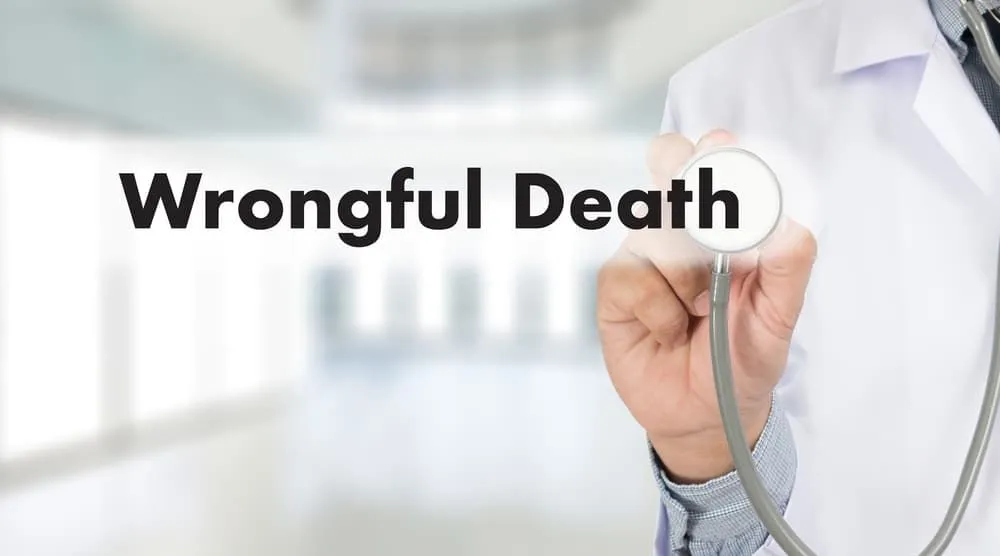 Wrongful Death text showing by doctor with stethoscope