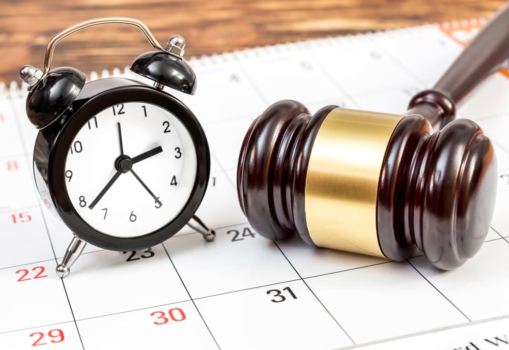 Judge's gavel with clock and calendar observing statute of limitation in wrongful death case
