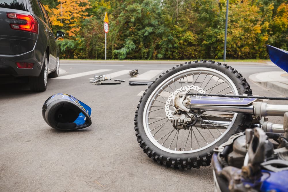 Motorcycle accident with car on the street